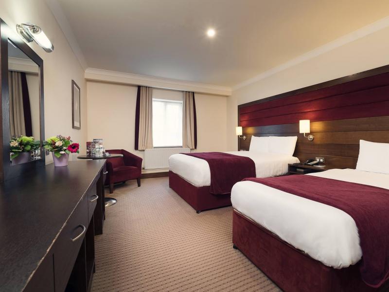 Our standard family room features one double and one single bed with space for an extra bed or cot