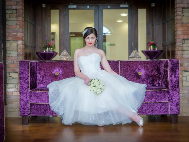 A Bride enjoying the sights in our stunning Stone Lobby
