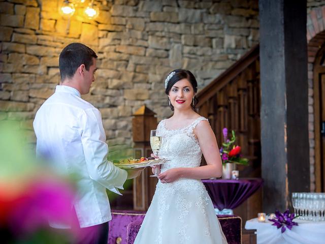 A Bride enjoying our Champagne reception in our stunning Stone Lobby