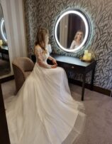 Bride at mirror