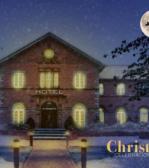 Cosy hotel with festive lighting, snowy trees, moonlit sky, and a Christmas celebration theme, ideal for winter getaways.